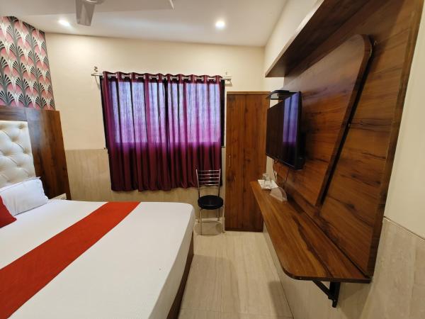 Hotel Dream Palace Residency - Near LBS Marg Kural West : photo 4 de la chambre chambre deluxe