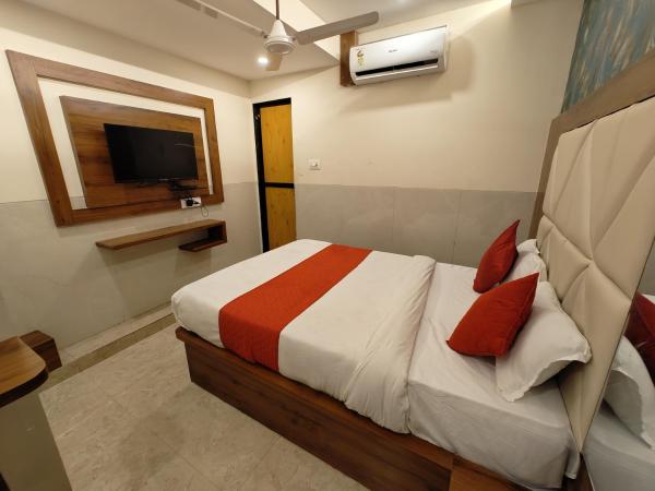 Hotel Dream Palace Residency - Near LBS Marg Kural West : photo 5 de la chambre chambre lit king-size supérieure