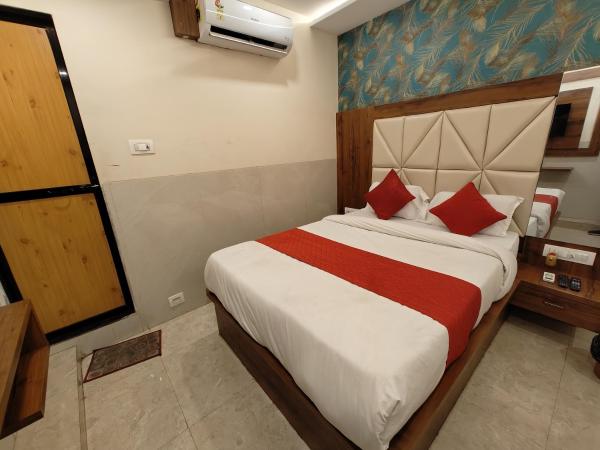 Hotel Dream Palace Residency - Near LBS Marg Kural West : photo 6 de la chambre chambre lit king-size supérieure