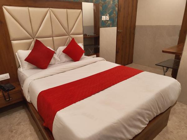 Hotel Dream Palace Residency - Near LBS Marg Kural West : photo 2 de la chambre chambre lit king-size supérieure