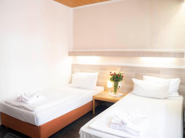 Hotel Astoria Stuttgart City : photo 2 de la chambre chambre lits jumeaux