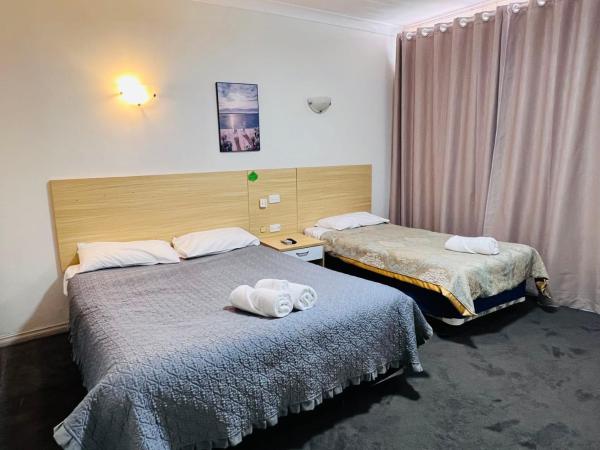 Jacksons Motor Inn : photo 4 de la chambre chambre de luxe double ou lits jumeaux avec baignoire spa