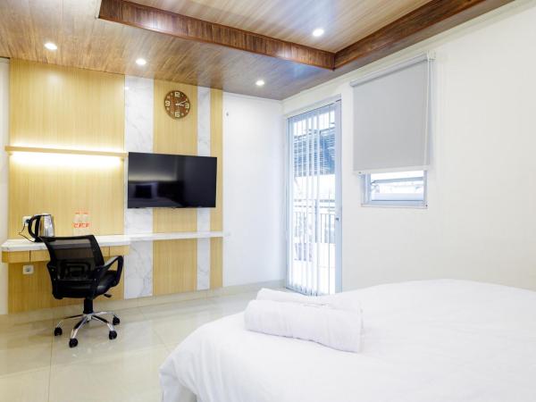 Urbanview Hotel Kota Tua Jakarta : photo 3 de la chambre chambre double deluxe