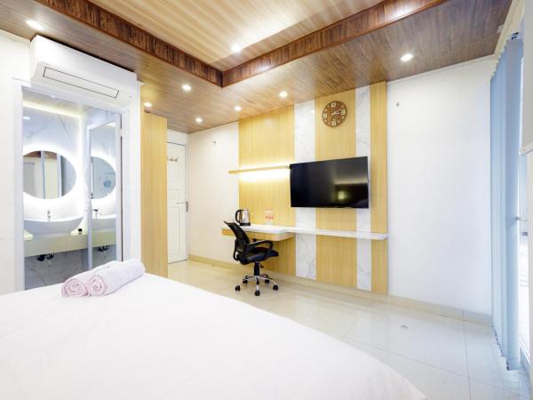 Urbanview Hotel Kota Tua Jakarta : photo 4 de la chambre chambre double deluxe