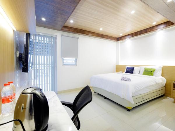 Urbanview Hotel Kota Tua Jakarta : photo 5 de la chambre chambre double deluxe