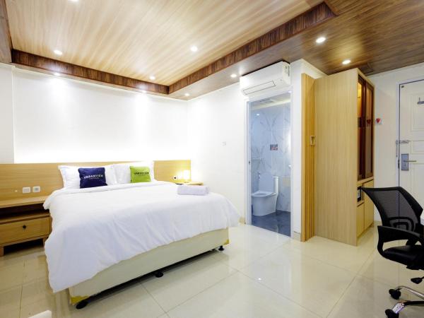Urbanview Hotel Kota Tua Jakarta : photo 2 de la chambre chambre double deluxe