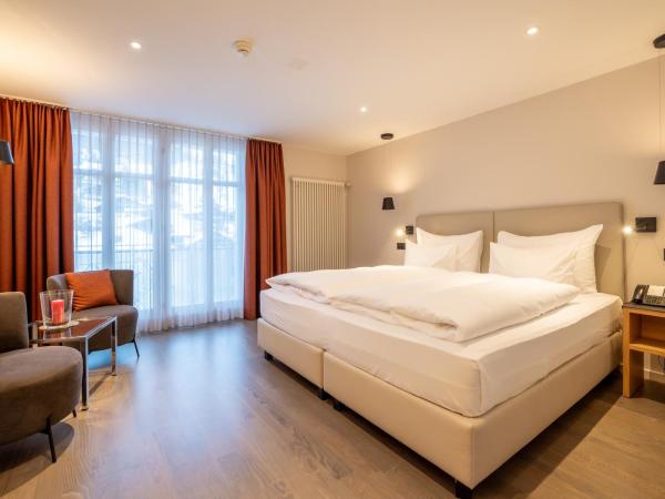 Belvedere Swiss Quality Hotel : photo 1 de la chambre chambre double ou lits jumeaux classique - climatisation - vue sur jardin