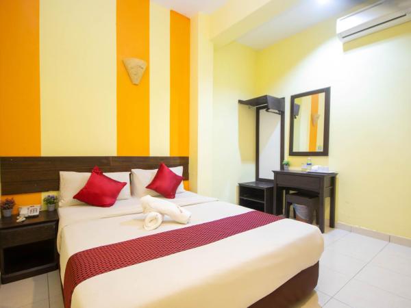 Sun Inns Rest House Kuantan : photo 2 de la chambre hébergement de luxe avec fenêtre