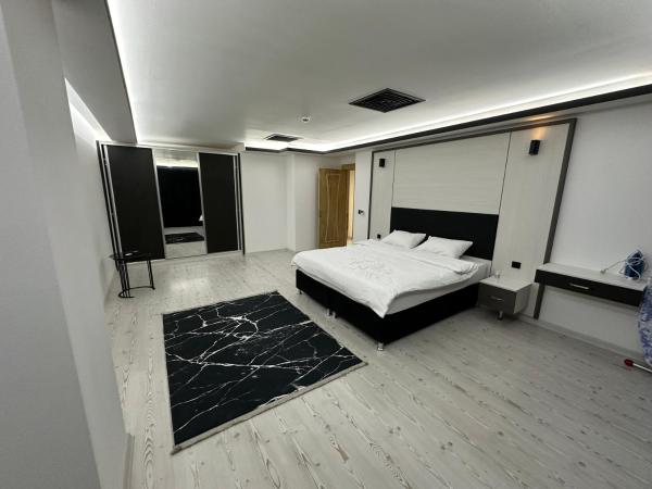KT Home Hotel & Apartments : photo 2 de la chambre suite lit king-size