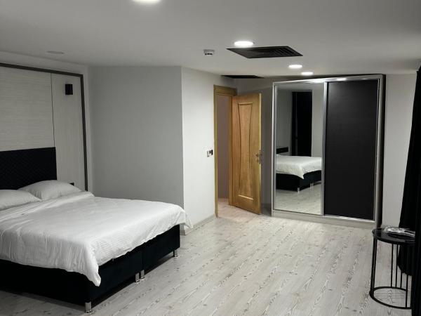 KT Home Hotel & Apartments : photo 8 de la chambre suite lit king-size