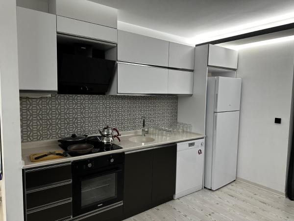 KT Home Hotel & Apartments : photo 7 de la chambre suite lit king-size