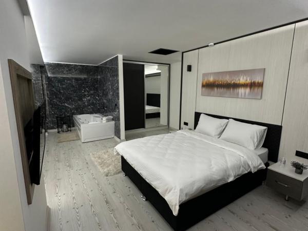 KT Home Hotel & Apartments : photo 6 de la chambre suite lit king-size