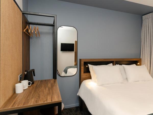 Haka House Auckland City : photo 1 de la chambre chambre lit king-size