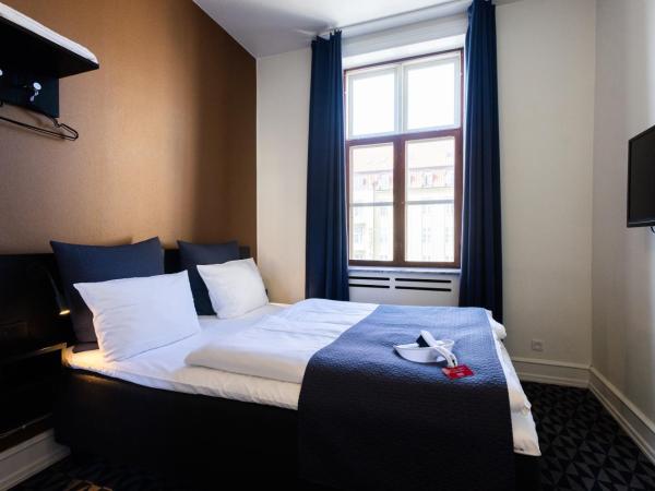Milling Hotel Ritz Aarhus City : photo 4 de la chambre petite chambre lit queen-size