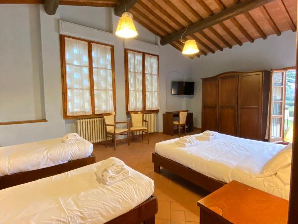 Casale dei cento Acri : photo 3 de la chambre chambre quadruple