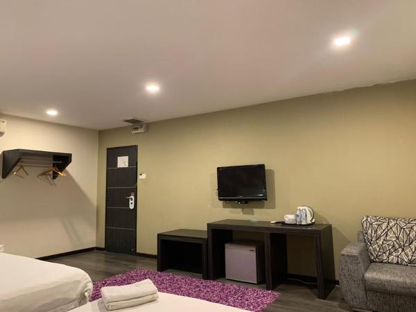 I Garden Hotel : photo 3 de la chambre chambre familiale