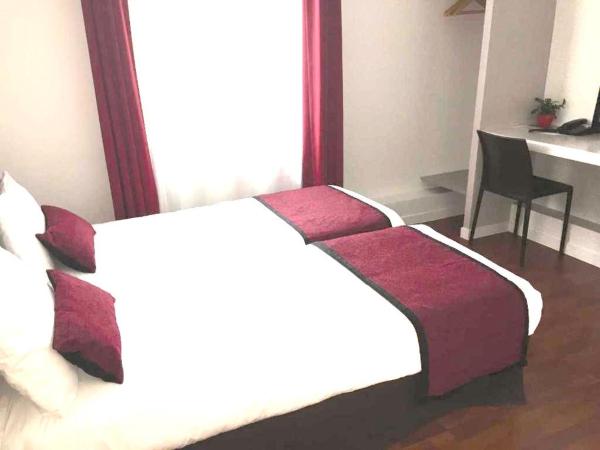 Hôtel Vendôme : photo 3 de la chambre chambre lits jumeaux climatisée