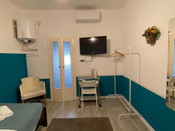 Maison Sarraj Affittacamere : photo 2 de la chambre chambre simple avec salle de bains privative