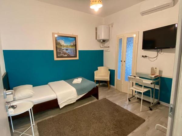Maison Sarraj Affittacamere : photo 1 de la chambre chambre simple avec salle de bains privative