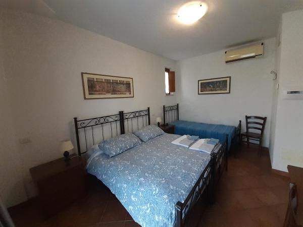 B&B La Verbena : photo 8 de la chambre chambre double ou lits jumeaux avec lit d'appoint