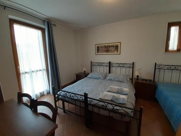 B&B La Verbena : photo 9 de la chambre chambre double ou lits jumeaux avec lit d'appoint