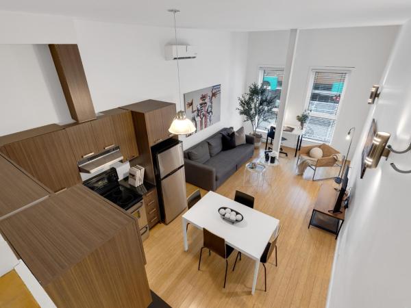 Liv MTL Main : photo 4 de la chambre main-202 | spacious studio suite + mezzanine with ladder access