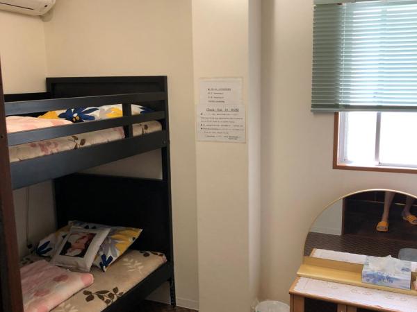 Hanmadang : photo 1 de la chambre chambre lits jumeaux avec salle de bains commune