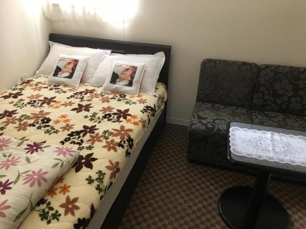 Hanmadang : photo 1 de la chambre chambre lits jumeaux avec salle de bains commune