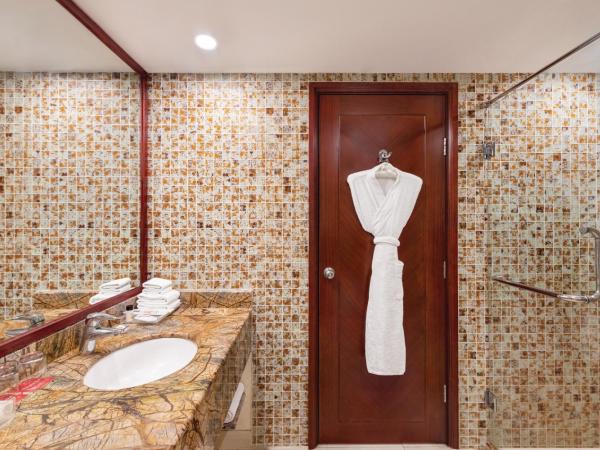 Ramada by Wyndham Jaipur Jaisinghpura : photo 1 de la chambre deluxe king room (non smoking)