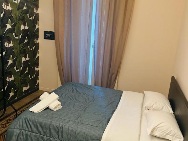 Central Hostel Milano : photo 6 de la chambre chambre double ou lits jumeaux avec salle de bains commune