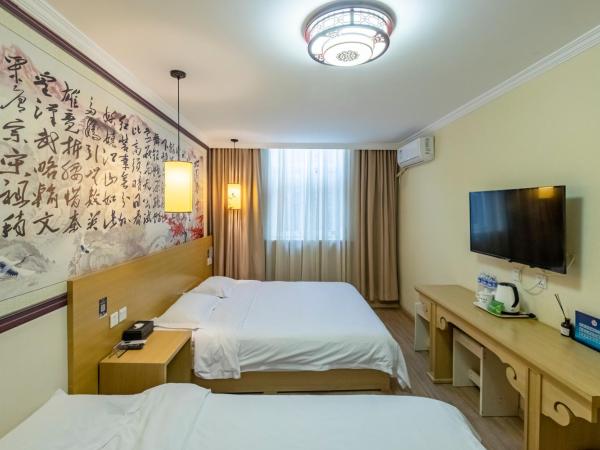 Happy Dragon City Center Alley Hotel -In the city center with big window&heater, ticket service&Free Coffee&Food recommendation,Near Tian Anmen Forbiddencity,Easy to get traditional Walking area&Shichahai : photo 4 de la chambre chambre lits jumeaux deluxe