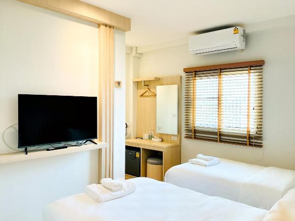 Zhennan Teabar Hotel : photo 2 de la chambre chambre lits jumeaux avec salle de bains privative