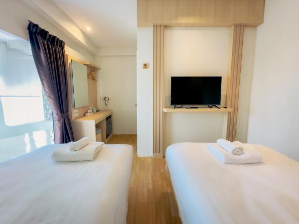 Zhennan Teabar Hotel : photo 1 de la chambre chambre lits jumeaux - vue sur ville