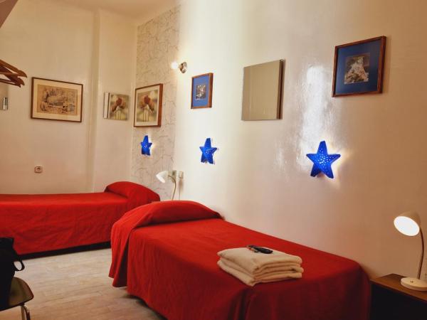 Casa de Huespedes Dolce Vita : photo 5 de la chambre chambre lits jumeaux avec lit d’appoint - 301