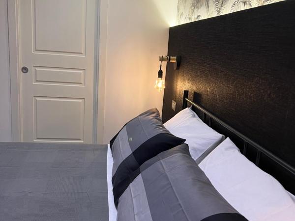 Nanà Home : photo 2 de la chambre chambre double deluxe - vue latérale sur mer