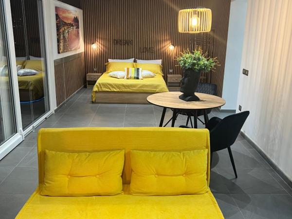 Nanà Home : photo 1 de la chambre chambre lit king-size avec baignoire spa