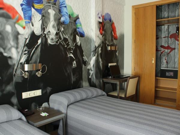 Hostal 4C Cuatro Caminos : photo 3 de la chambre chambre lits jumeaux