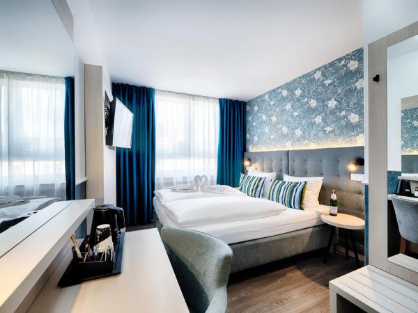 Home Hotel : photo 1 de la chambre chambre double