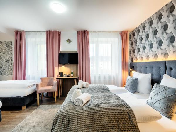 Home Hotel : photo 7 de la chambre chambre quadruple standard