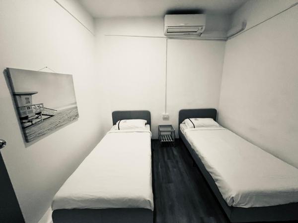 K2 Guesthouse Central : photo 1 de la chambre chambre lits jumeaux Économique