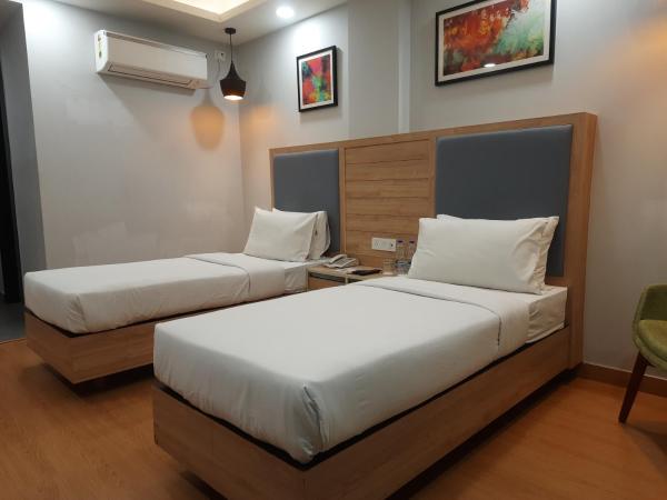 Inde Hotel Sec- 49, Golf Course Extension, Gurgaon : photo 7 de la chambre chambre lits jumeaux