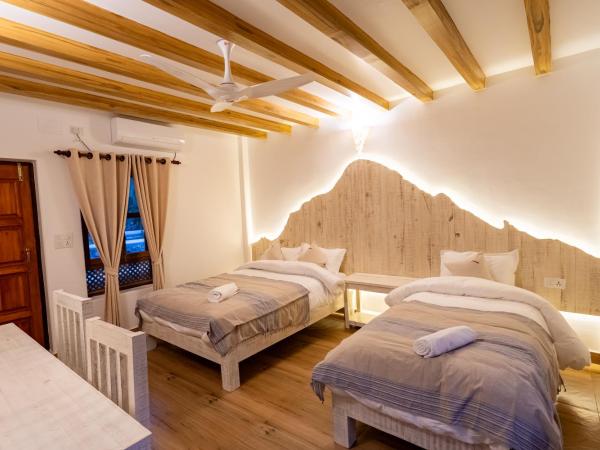Purna : photo 3 de la chambre chambre double avec lit d'appoint