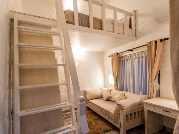 Purna : photo 4 de la chambre chambre familiale - vue sur jardin
