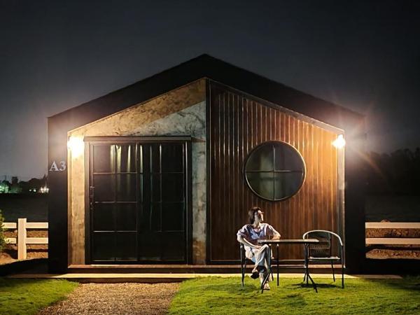 ฉันรักเธอ โฮมสเตย์ at กาญจนบุรี : photo 3 de la chambre villa deluxe