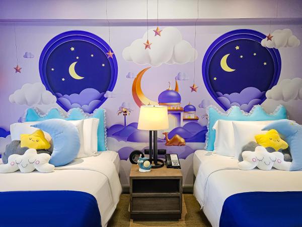 Avani Pattaya Resort : photo 10 de la chambre chambre familiale - vue sur jardin