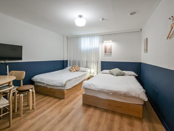 SSH Myeongdong Dongdo Hostel : photo 6 de la chambre chambre quadruple