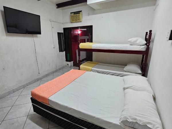 Pousada Casa da Pedra : photo 10 de la chambre chambre quadruple Économique