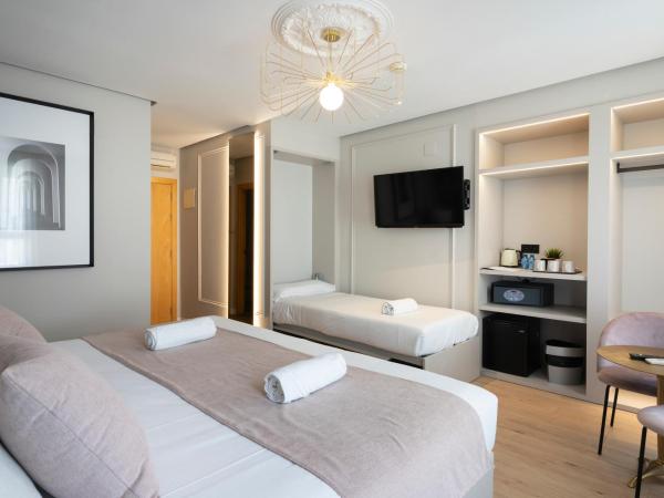 YOU & CO. J. Botánico Boutique : photo 4 de la chambre chambre triple