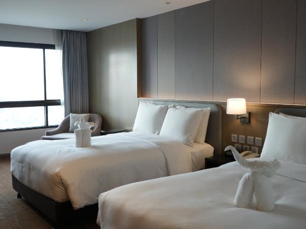 Centara Riverside Hotel Chiang Mai : photo 2 de la chambre suite 2 chambres