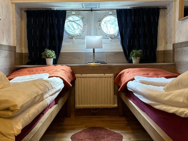 Den Röda Båten : photo 1 de la chambre cabine sur bateau (2 adultes)